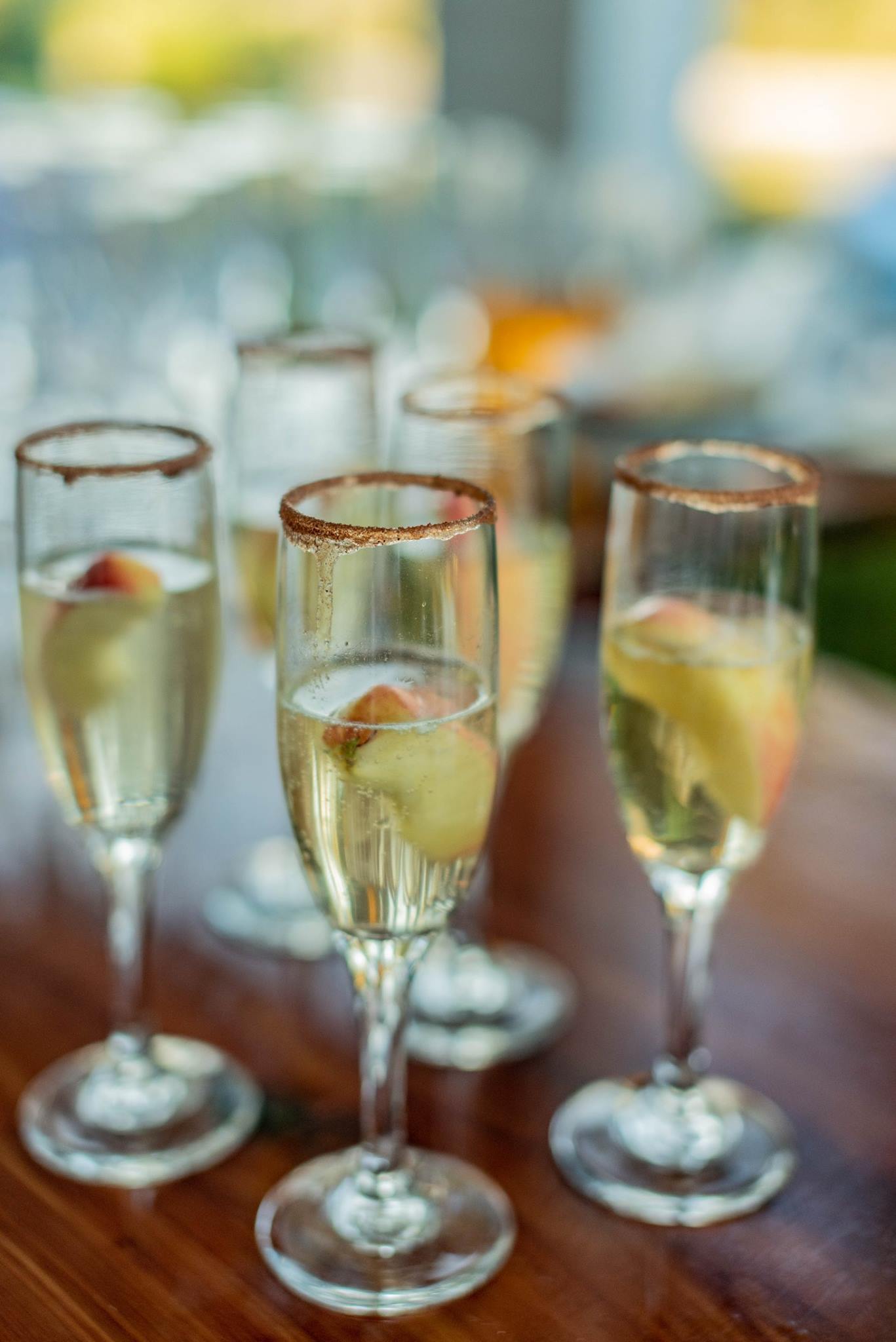 champagne glasses with fruit